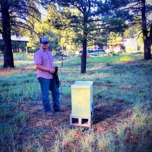 Nate setting up the Community Garden hive in Parks